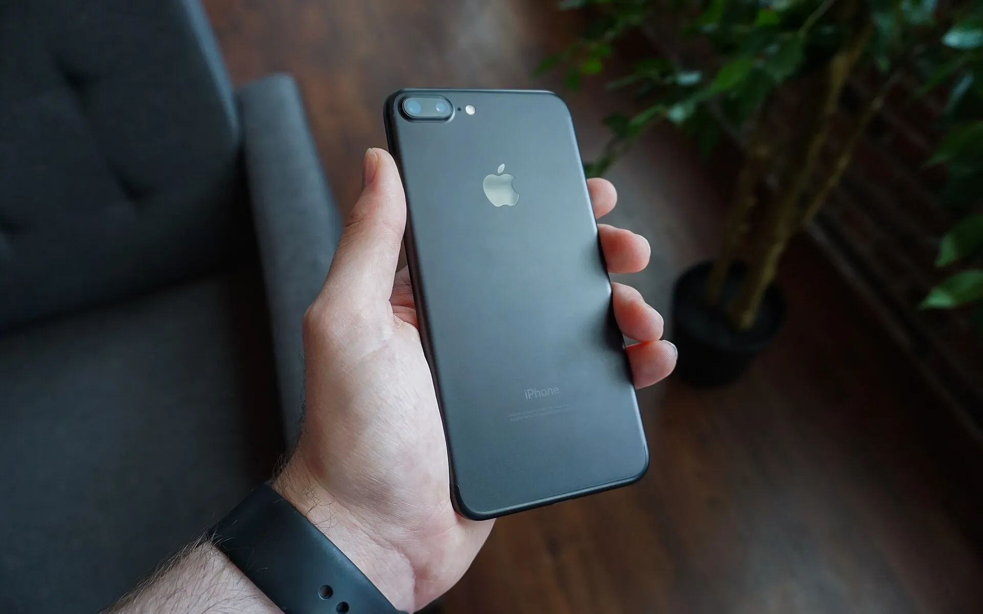 Black smartphone in hand