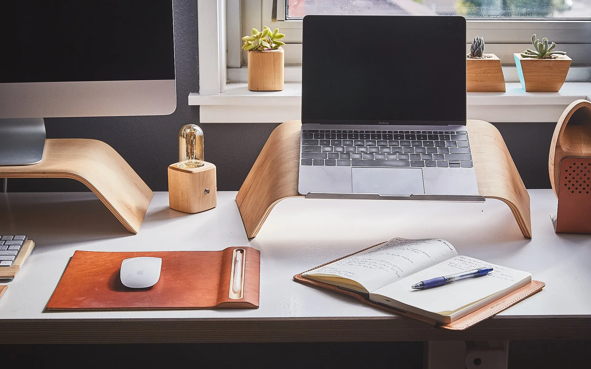 Notepad on a busy workspace