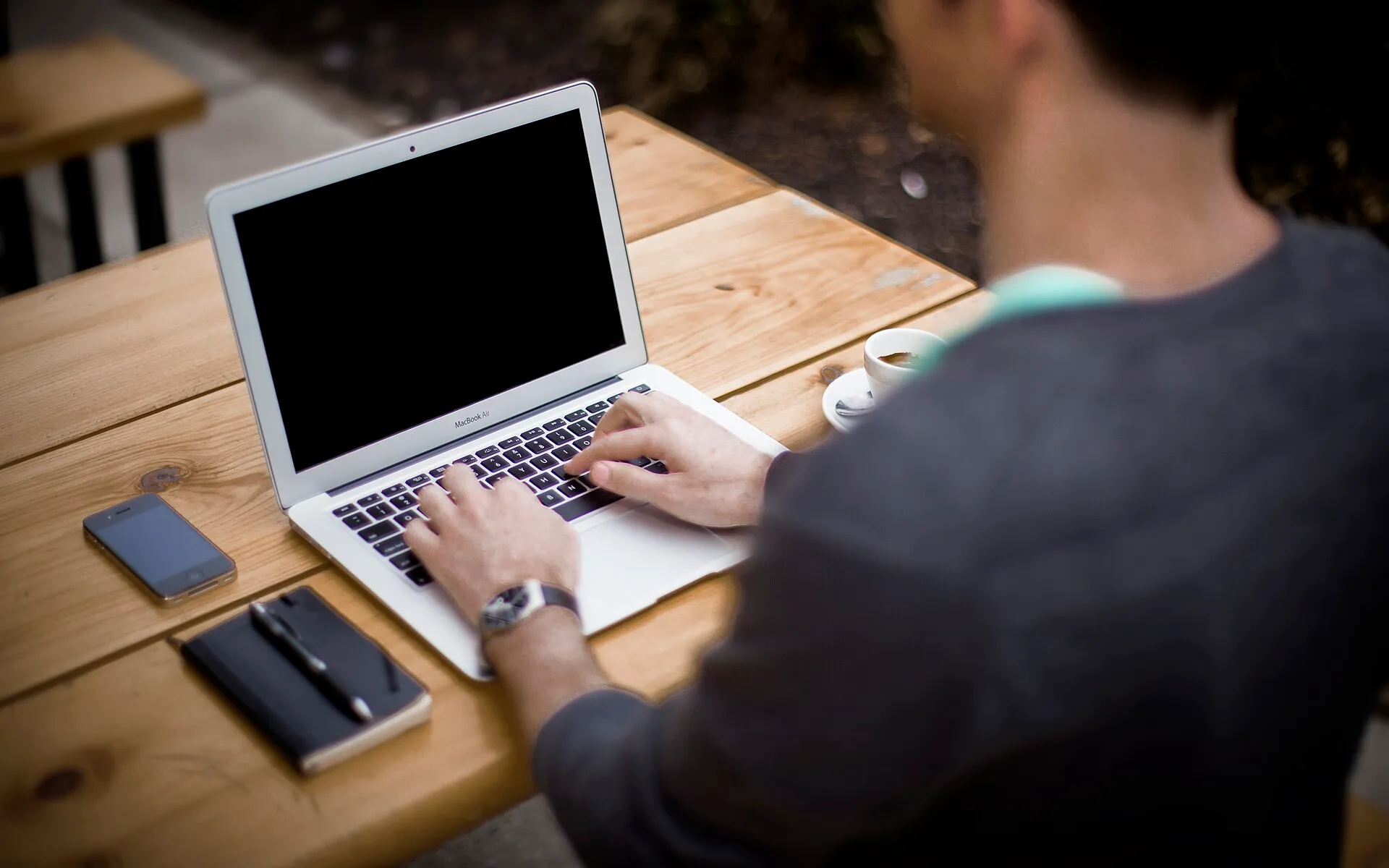 Working on a laptop outdoors