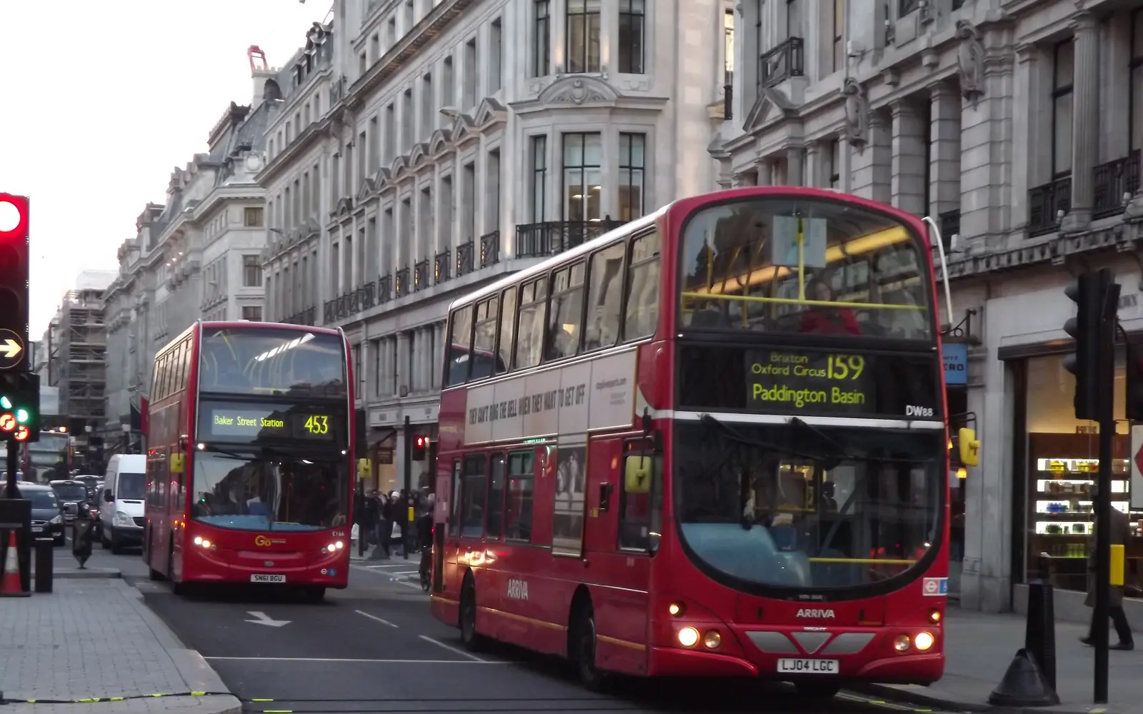 Busy London street with red bus