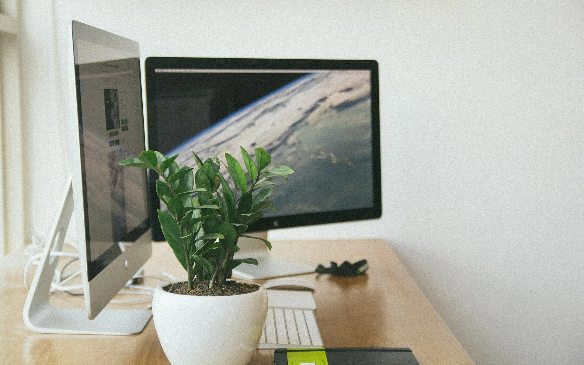 Apple computer monitors desk